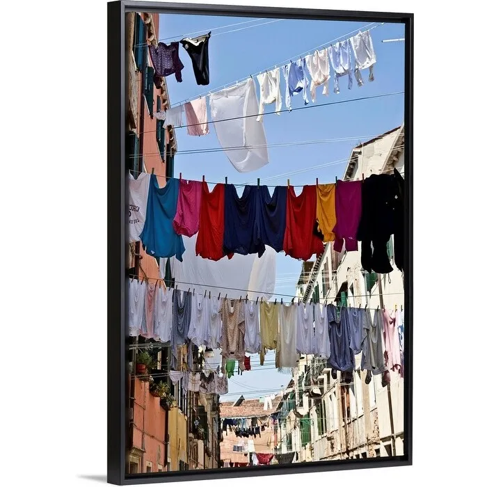 "Clotheslines hanging from apartments in Venice, Italy" Black Float Frame Canvas Art