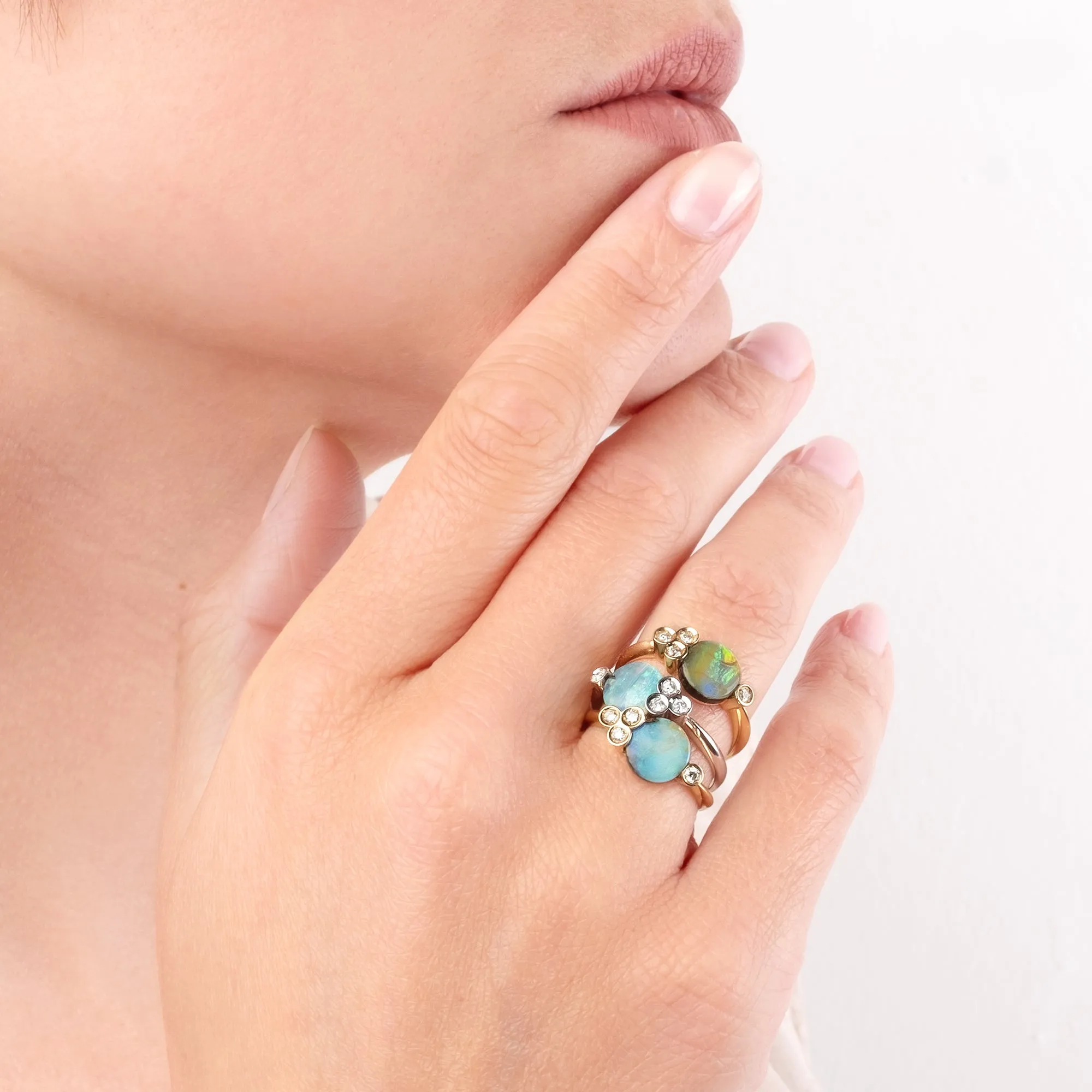 Round-cut Boulder opal tris ring set