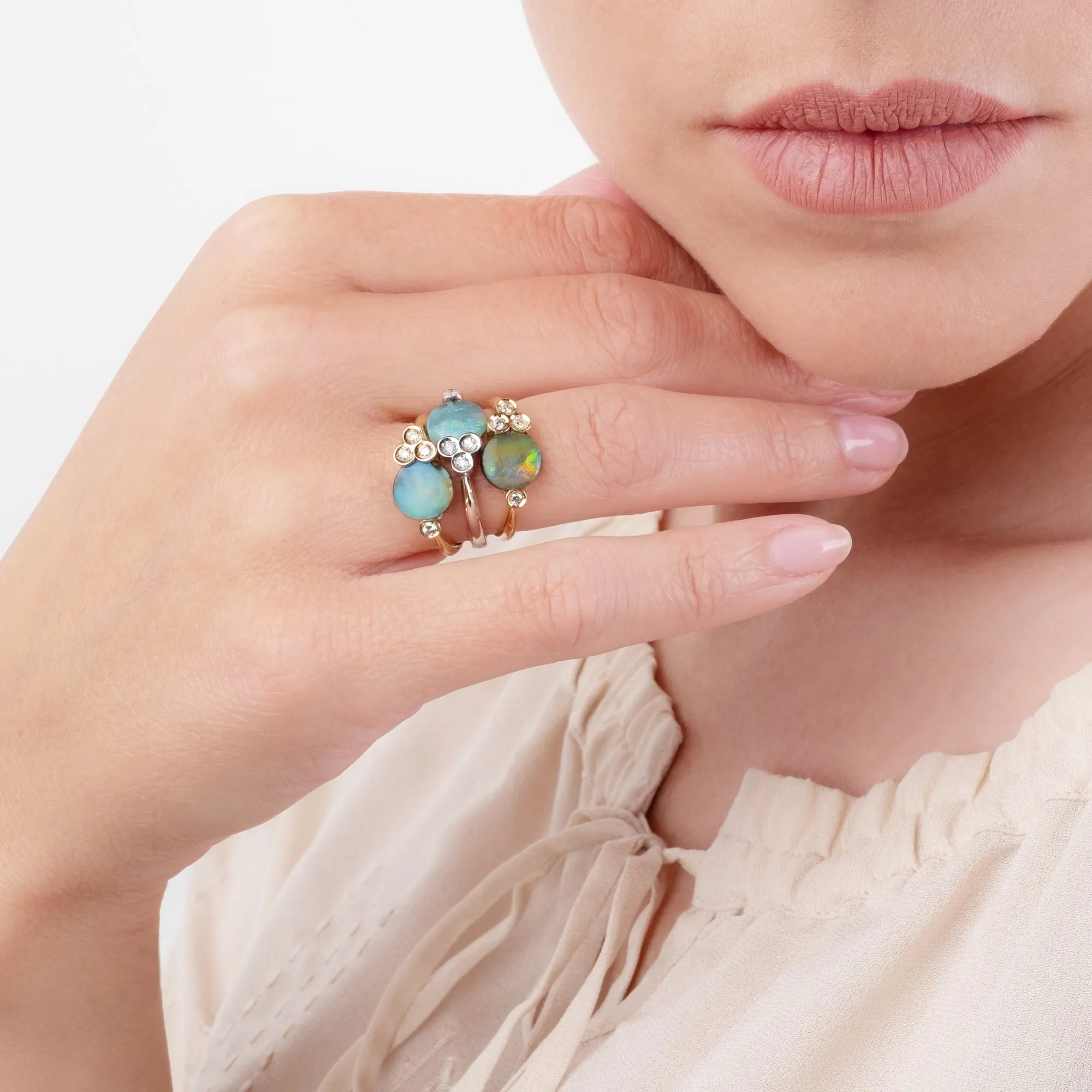 Round-cut Boulder opal tris ring set