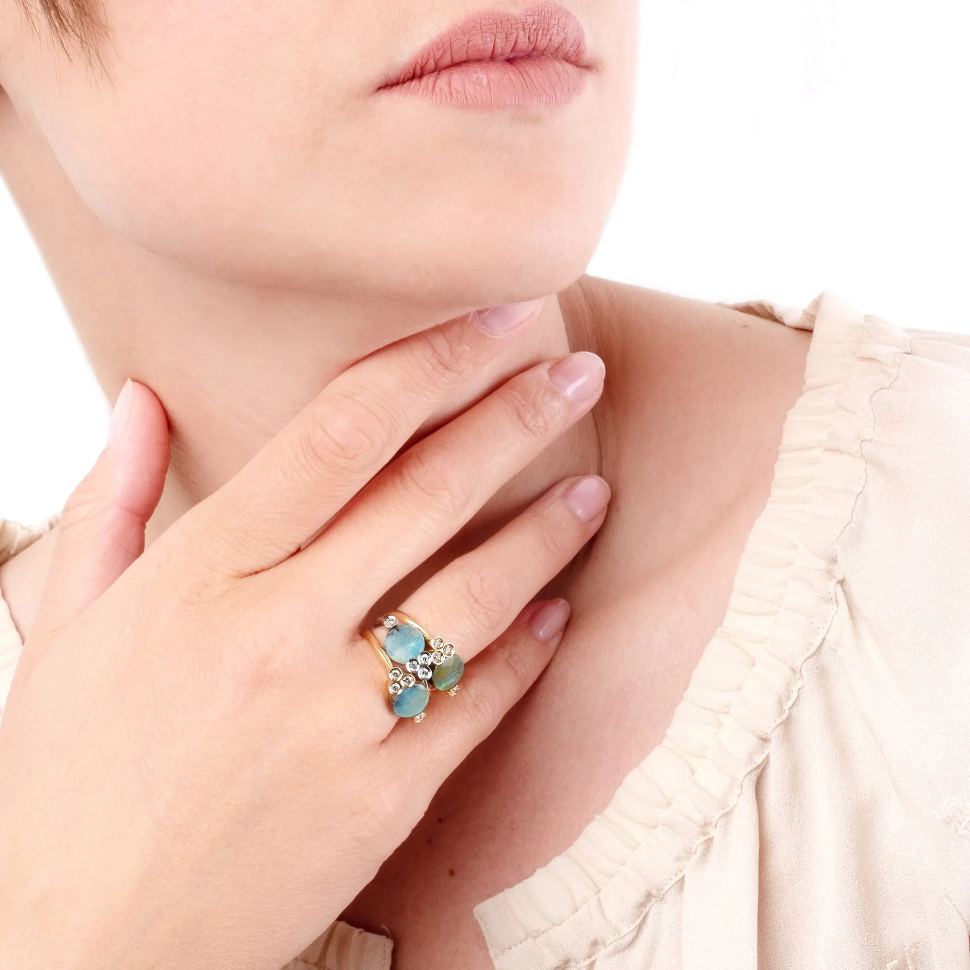 Round-cut Boulder opal tris ring set